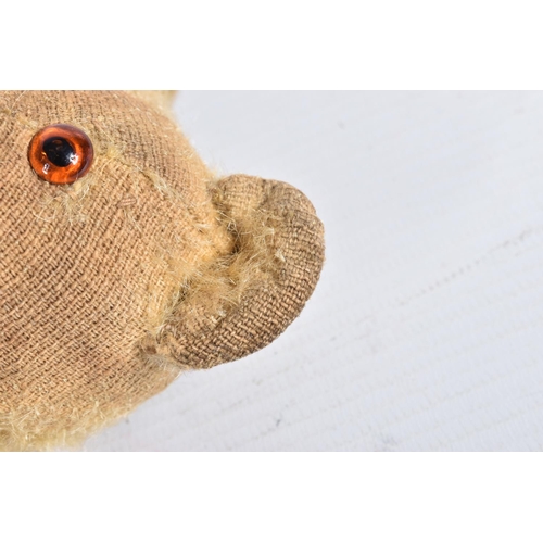 87 - A GERMAN BLONDE MOHAIR TEDDY BEAR, c.1914 - 1920, original glued amber and black glass eyes (both wi... 