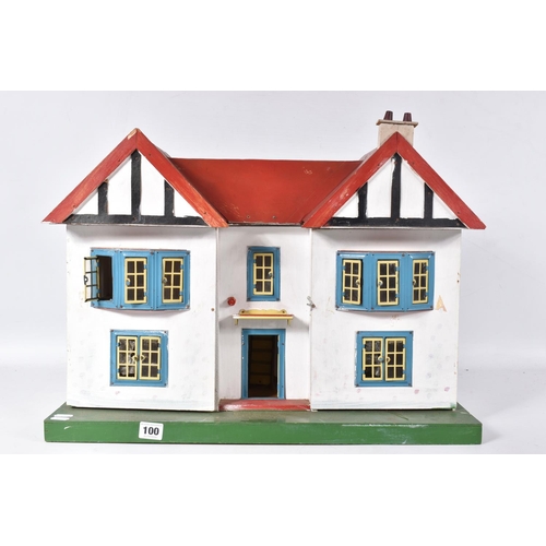 100 - A WOODEN DOLLS HOUSE, c.1950's, modelled as a mock Tudor villa with half-timbered gables, double fro... 