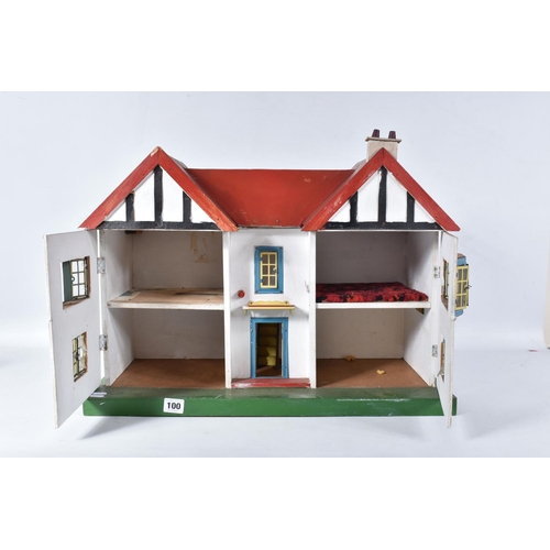 100 - A WOODEN DOLLS HOUSE, c.1950's, modelled as a mock Tudor villa with half-timbered gables, double fro... 