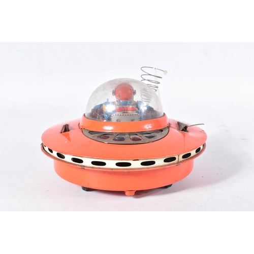 113 - AN UNBOXED YOSHIYA KO TOYS BATTERY OPERATED TINPLATE SPACE PATROL SPACESHIP, red/orange body, Bump n... 