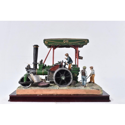 116 - A PART BOXED JULIANA COLLECTION HAND FINISHED RESIN MODEL OF A STEAM ROLLER, part of flywheel has br... 