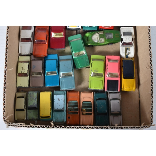 125 - A QUANTITY OF UNBOXED AND ASSORTED PLAYWORN MATCHBOX FORD CAR, VAN AND TRUCK/LORRY MODELS, majority ... 