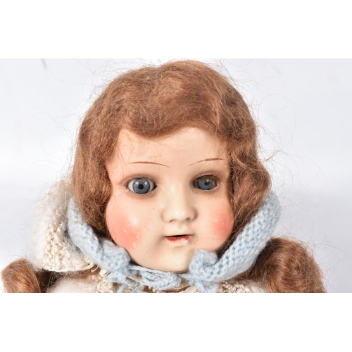 95 - A SIMON & HALBIG BISQUE HEAD DOLL, nape of neck marked 'S H with PB inside the five pointed star 190... 