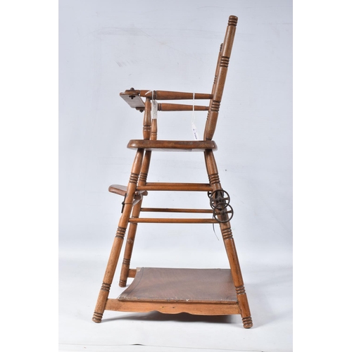 97 - A GERMAN PINE METAMORPHIC DOLLS HIGH CHAIR, c.1910, transfer decoration, tray features a line of col... 