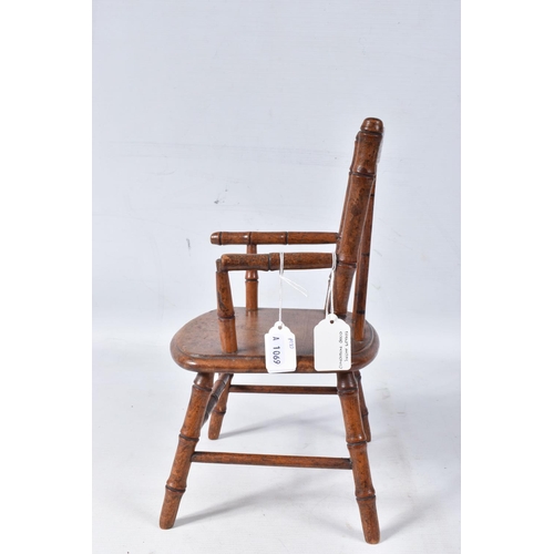 97 - A GERMAN PINE METAMORPHIC DOLLS HIGH CHAIR, c.1910, transfer decoration, tray features a line of col... 