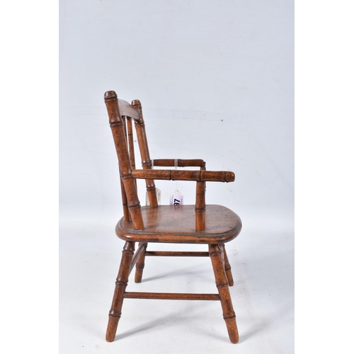 97 - A GERMAN PINE METAMORPHIC DOLLS HIGH CHAIR, c.1910, transfer decoration, tray features a line of col... 