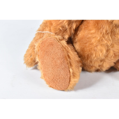 149 - A MODERN GINGER PLUSH TEDDY BEAR, amber and black plastic eyes, vertically stitched nose, jointed bo... 