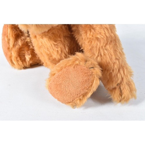 149 - A MODERN GINGER PLUSH TEDDY BEAR, amber and black plastic eyes, vertically stitched nose, jointed bo... 