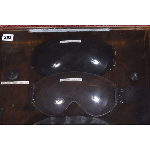 393 - A LATE 20TH CENTURY DECONSTRUCTED FLYING HELMET, this is displayed inside a wooden display case, the... 