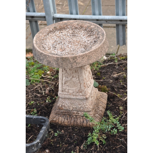 1006 - A COMPOSITE BIRD BATH with tapered square base and round top 50cm high along with three terracotta c... 