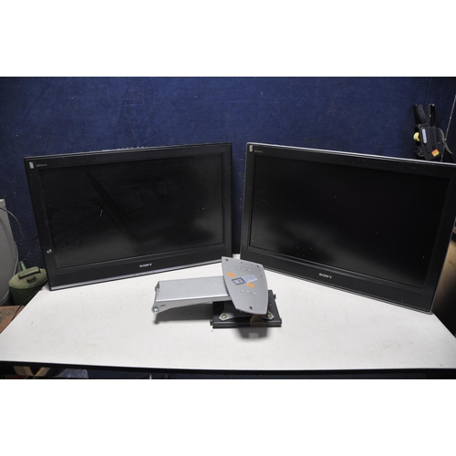 1065 - TWO SONY KDL-32D3000 32in TV with no remotes, both attached to pivoting wall brackets (both PAT pass... 