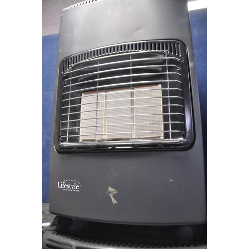 1073 - A COLLECTION OF GAS HEATERS comprising three Campingaz gas heaters IR5000 and a lifestyle LD468A gas... 