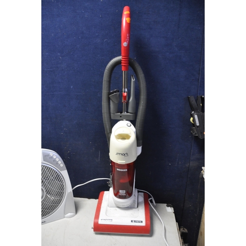 1085 - A HOOVER SE1600 UPRIGHT VACUUM along with a Holmes HBF30R fan with control and a Flymo MEV1800 garde... 