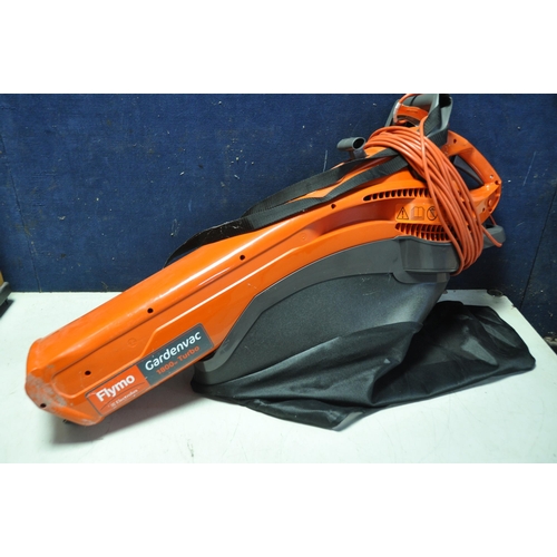 1085 - A HOOVER SE1600 UPRIGHT VACUUM along with a Holmes HBF30R fan with control and a Flymo MEV1800 garde... 