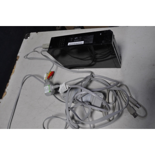 1091 - A NINTENDO Wii with power supply and cable (no controllers) (PAT pass and powers up but not tested a... 