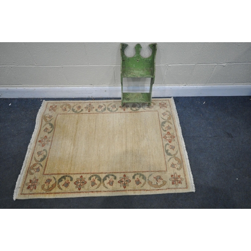 1201 - A MAHOGANY SPINDLE WALL SHELF, a painted wall shelf, and a G H Frith floral rug, 152cm x 91cm (3)