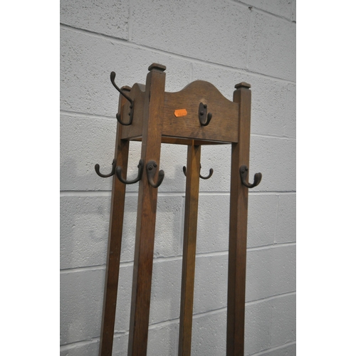 1213 - AN EARLY 20TH CENTURY OAK SQUARE TAPERED COAT/HAT STAND, height 180cm