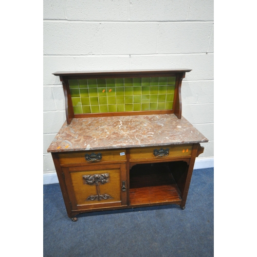 1217 - AN ARTS AND CRAFTS MAHOGANY WASHSTAND, with a green tiled mirror back, marble top, on a base with tw... 