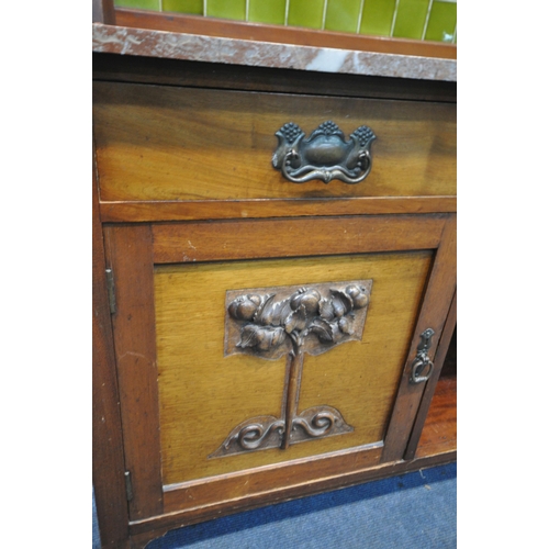 1217 - AN ARTS AND CRAFTS MAHOGANY WASHSTAND, with a green tiled mirror back, marble top, on a base with tw... 