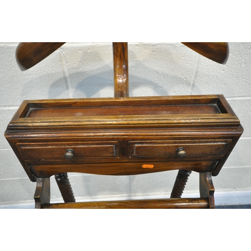 1253 - A REPRODUCTION HARDWOOD VALET STAND, with two small drawers, height 125cm (condition:-good condition... 