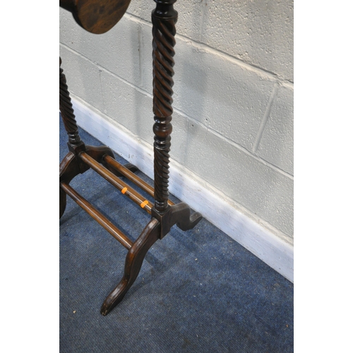 1253 - A REPRODUCTION HARDWOOD VALET STAND, with two small drawers, height 125cm (condition:-good condition... 