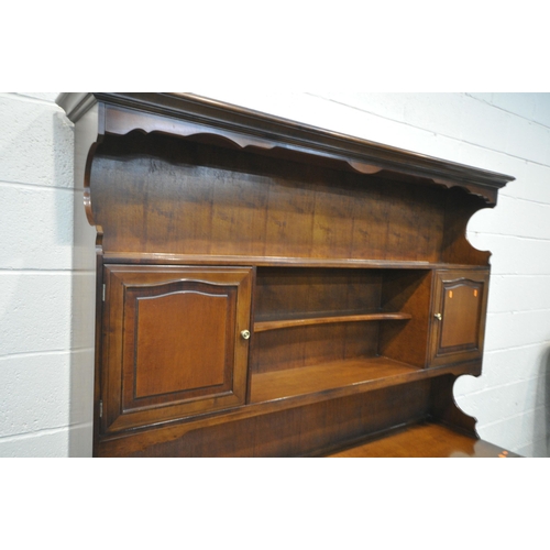 1255 - A STAG MINSTREL DRESSER, width 176cm x depth 46cm x height 198cm x height of base 78cm (condition:-g... 