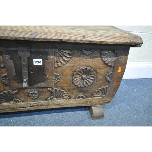 1261 - AN ANTIQUE AND NEWER OAK/HARDWOOD BLANKET CHEST, carved front panel, on twin feet, width 89cm x dept... 