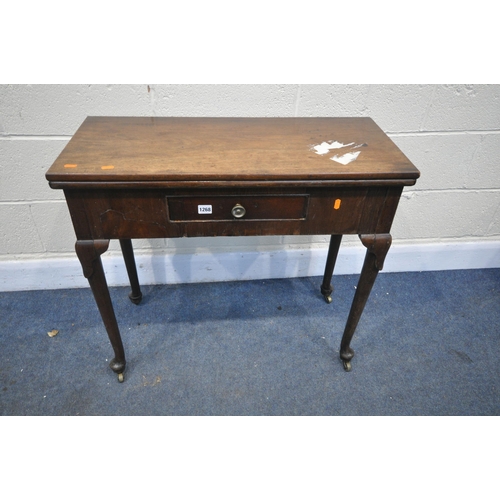 1268 - A GEORGE III MAHOGANY TEA TABLE, the fold over top and gate leg, single frieze drawer, on cylindrica... 