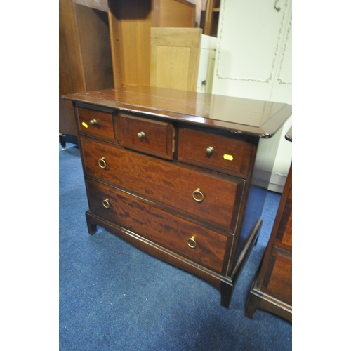 1283 - TWO STAG MINSTREL MAHOGANY LOW CHEST OF THREE SHORT OVER TWO LONG DRAWERS, width 82cm x depth 47cm x... 