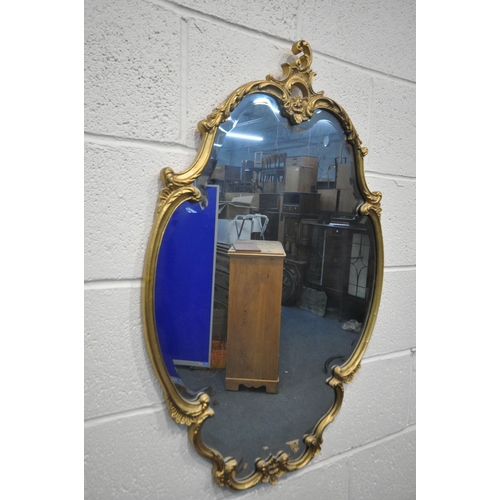 1300 - A FRENCH GILT FRAMED BEVELLED EDGE WALL MIRROR, and a frameless mirror (2)