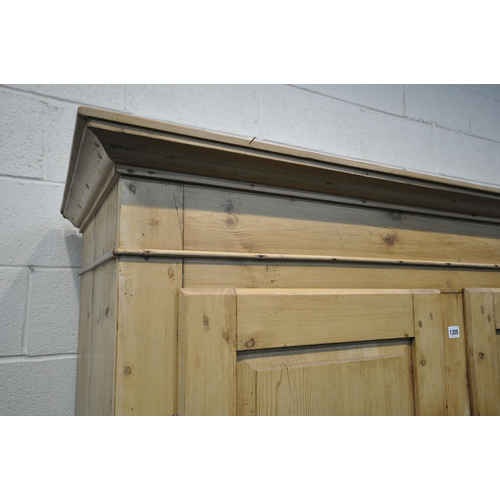 1305 - A 19TH CENTURY AND LATER PINE PANTRY/LARDER CUPBOARD, with a loose cornice, the two fielded panel do... 