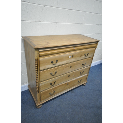 1308 - A 19TH CENTURY FRENCH PINE CHEST OF FIVE DRAWERS, with a single frieze drawer, swan neck handles, on... 