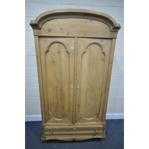 1314 - A 19TH CENTURY FRENCH PINE PANELLED TWO DOOR WARDROBE, above a single long drawer, width 117cm x dep... 