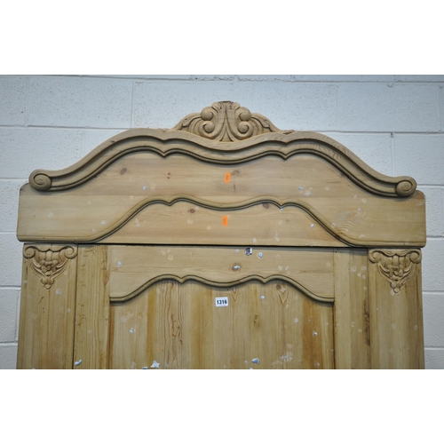 1316 - A FRENCH PINE PANELLED SINGLE DOOR ARMOIRE, with a foliate shaped cornice, and a single drawer, widt... 