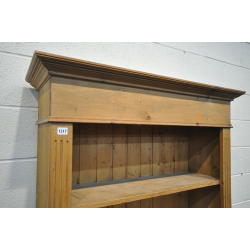 1317 - A MODERN PINE OPEN BOOKCASE, with four fixed shelves, width 105cm x depth 34cm x height 187cm (condi... 