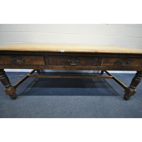 1321 - A LARGE 19TH CENTURY PINE FARMHOUSE TABLE, with three full length frieze drawers, on block and turne... 