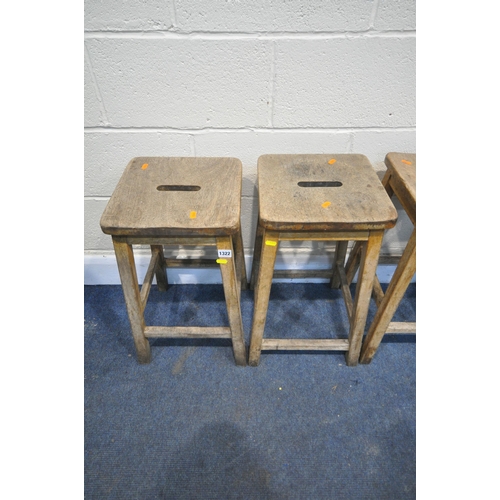 1322 - A SET OF SIX LATE 19TH EARLY 20TH CENTURY BEECH SCHOOL LABORATORY STOOLS, 34cm squared x height 56cm... 