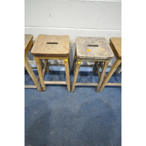 1322 - A SET OF SIX LATE 19TH EARLY 20TH CENTURY BEECH SCHOOL LABORATORY STOOLS, 34cm squared x height 56cm... 