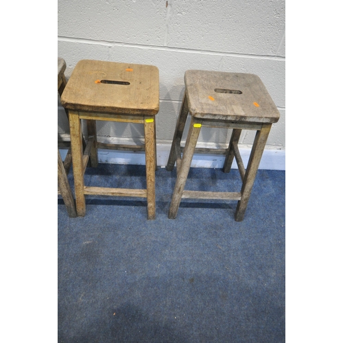 1322 - A SET OF SIX LATE 19TH EARLY 20TH CENTURY BEECH SCHOOL LABORATORY STOOLS, 34cm squared x height 56cm... 