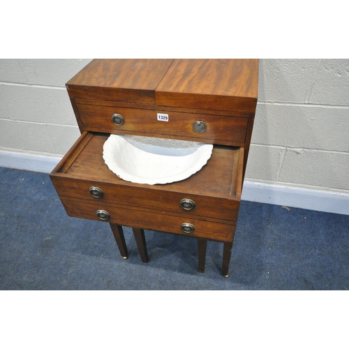 1329 - A GEORGIAN MAHOGANY GENTLEMANS WASHSTAND, the double flap top enclosing an arrangement of pigeon hol... 