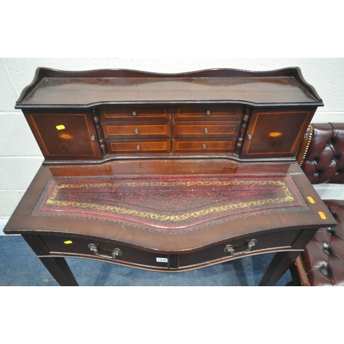 1339 - A 20TH CENTURY MAHOGANY CAPTAINS DESK, the raised back with two doors, flanking two banks of three d... 