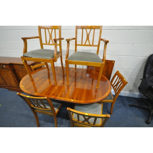 1341 - A YEW WOOD LOUNGE SUITE, comprising an oval twin pedestal dining table, with one additional leaf, op... 