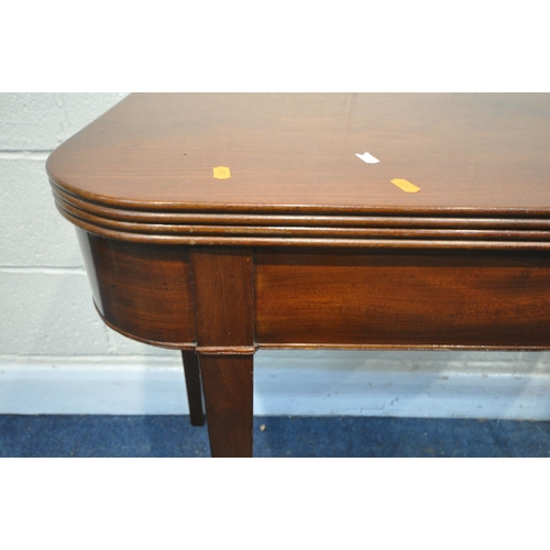 1350 - A GEORGIAN MAHOGANY TEA TABLE, with a fold over top, reeded edge, square tapered legs, open 91cm squ... 