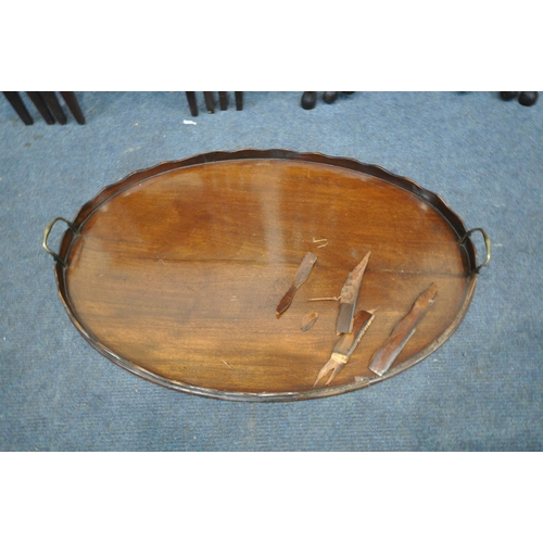 1352 - A GEORGIAN MAHOGANY OVAL TRAY, with a wavy top gallery, and twin brass handles, 76cm x 46cm (conditi... 