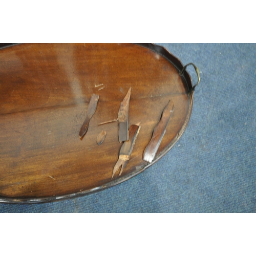 1352 - A GEORGIAN MAHOGANY OVAL TRAY, with a wavy top gallery, and twin brass handles, 76cm x 46cm (conditi... 