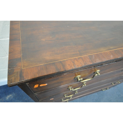 1357 - A GEORGIAN MAHOGANY AND CROSSBANDED CHEST OF FOUR LONG DRAWERS, with a brass swan neck handles, on b... 