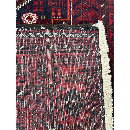 1361 - A 20TH CENTURY RED GROUND HAMADAN RUG, 193cm x 104cm (condition:-good condition)