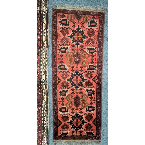 1363 - A 19TH CENTURY PERSIAN HOSSEINABAD CARPET RUNNER, red field, central cream medallion, length 284cm x... 