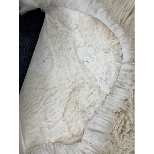 1371 - TWO LARGE FAUX SHEEP SKIN RUGS, 185cm x 151cm, and three small sheep skin rugs (5)