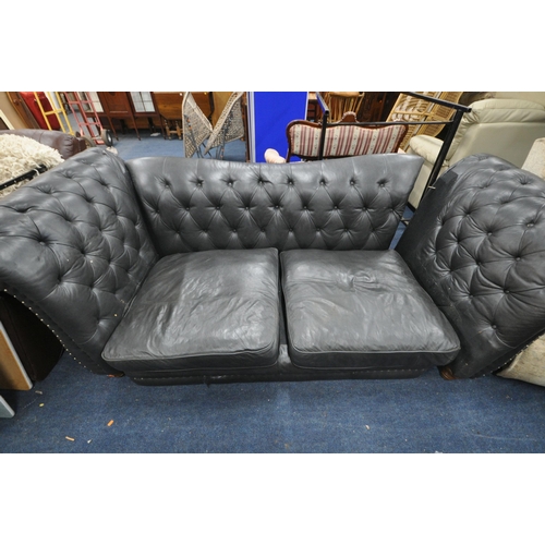 1372 - A LARGE BLACK CHESTERFIELD SOFA, approximate width 241cm x depth 140cm x height 92cm (condition:-no ... 